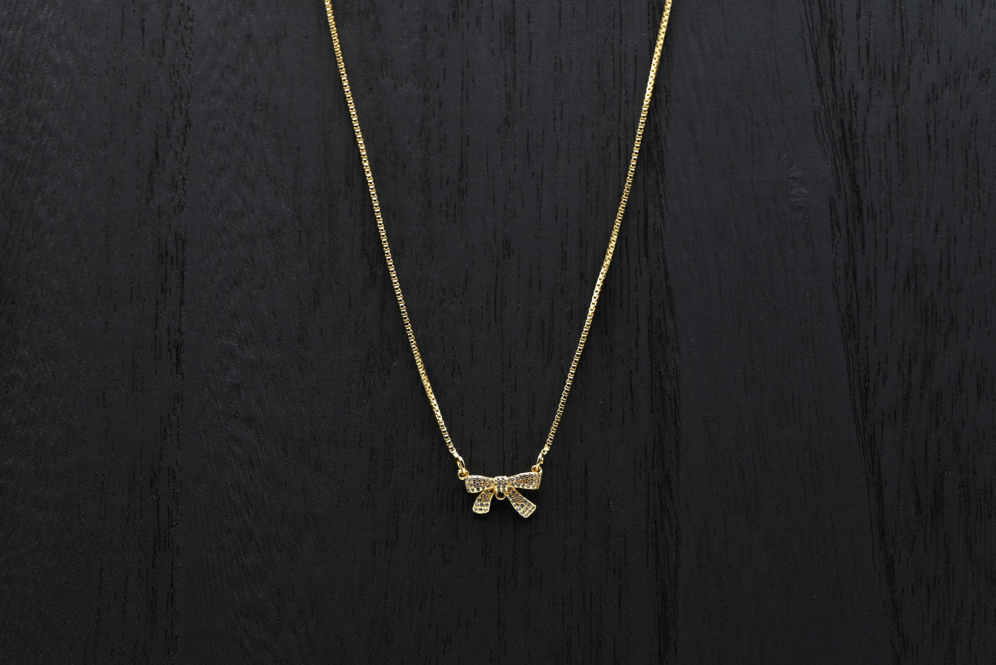 Studded Bow Pendant Necklace
